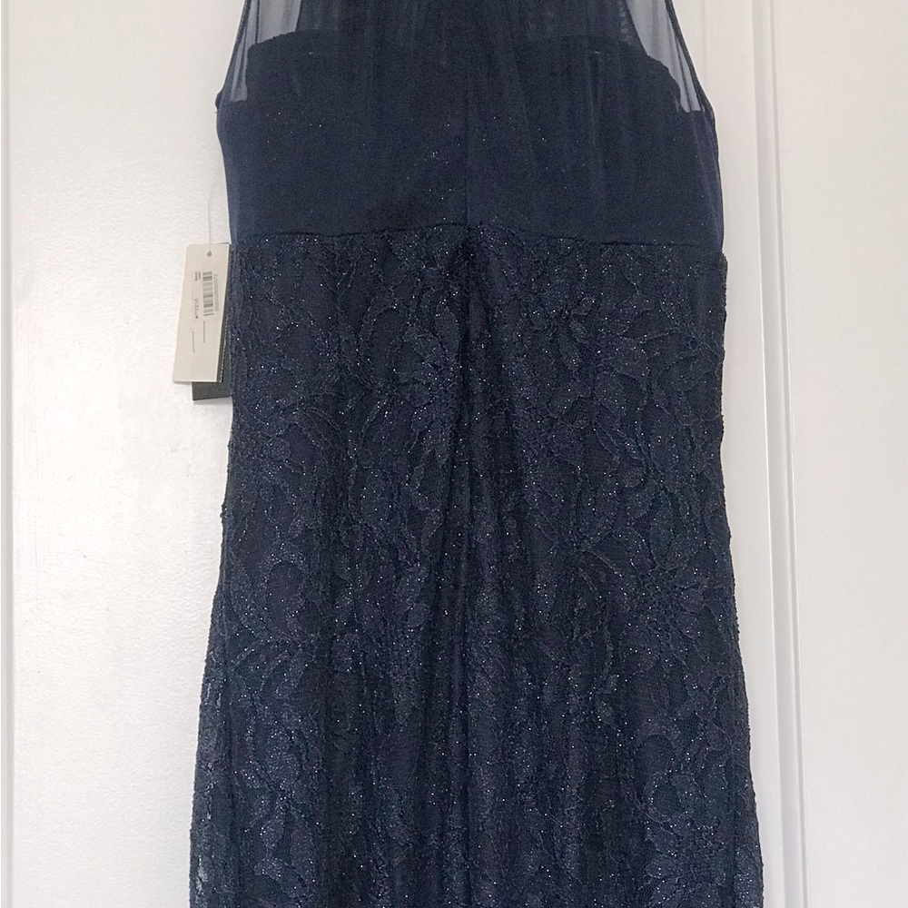 New navy blue, brand Nightwat, polyester and expanded elastan.Never used